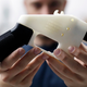 Defense Distributed’s Cody Wilson holds a 3D-printed gun called the Liberator in his Texas shop in August 2018.